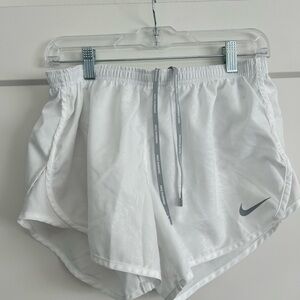 Lined white Nike running shorts in size M